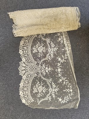 Lot 761 - Lace. Four large flounces, 19th century, & other lace