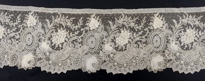 Lot 555 - Lace. A large flounce of Point de Gaze needlelace, Brussels, circa 1880