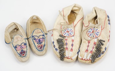 Lot 531 - Clothing. A pair of Native American beaded moccasins, early 20th century, & a child's pair similar
