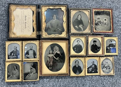 Lot 27 - Cased Images. A group of fourteen family portraits, c. 1860s